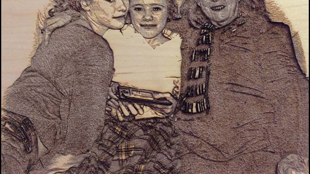 Laser photo imaging, a portrait etched onto veneered MDF