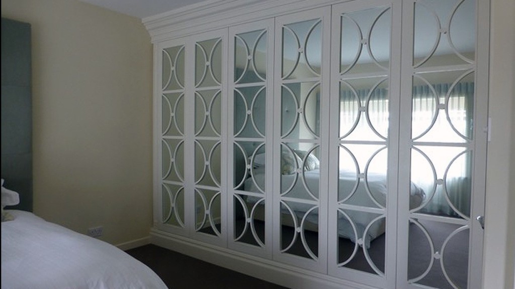 Casino Style mirrored Wardrobe Doors with Fretwork Inserts